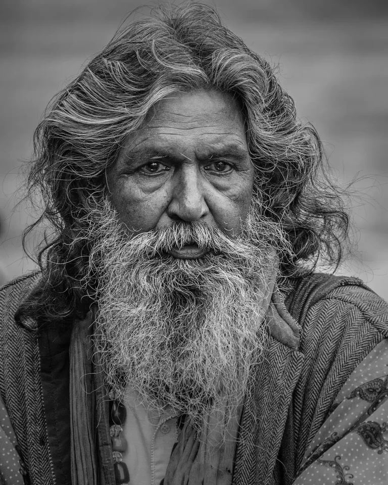 bearded man with long hair representing a grooming routine