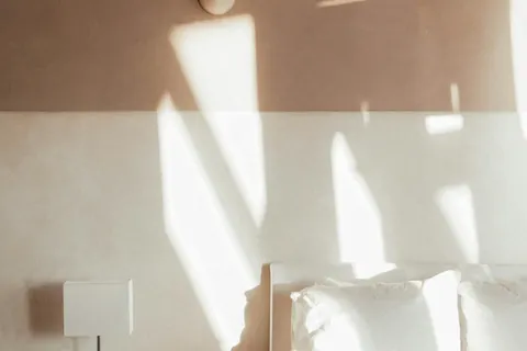 bedroom bed nightstand illustrating why faking confidence backfires (and what to do instead)