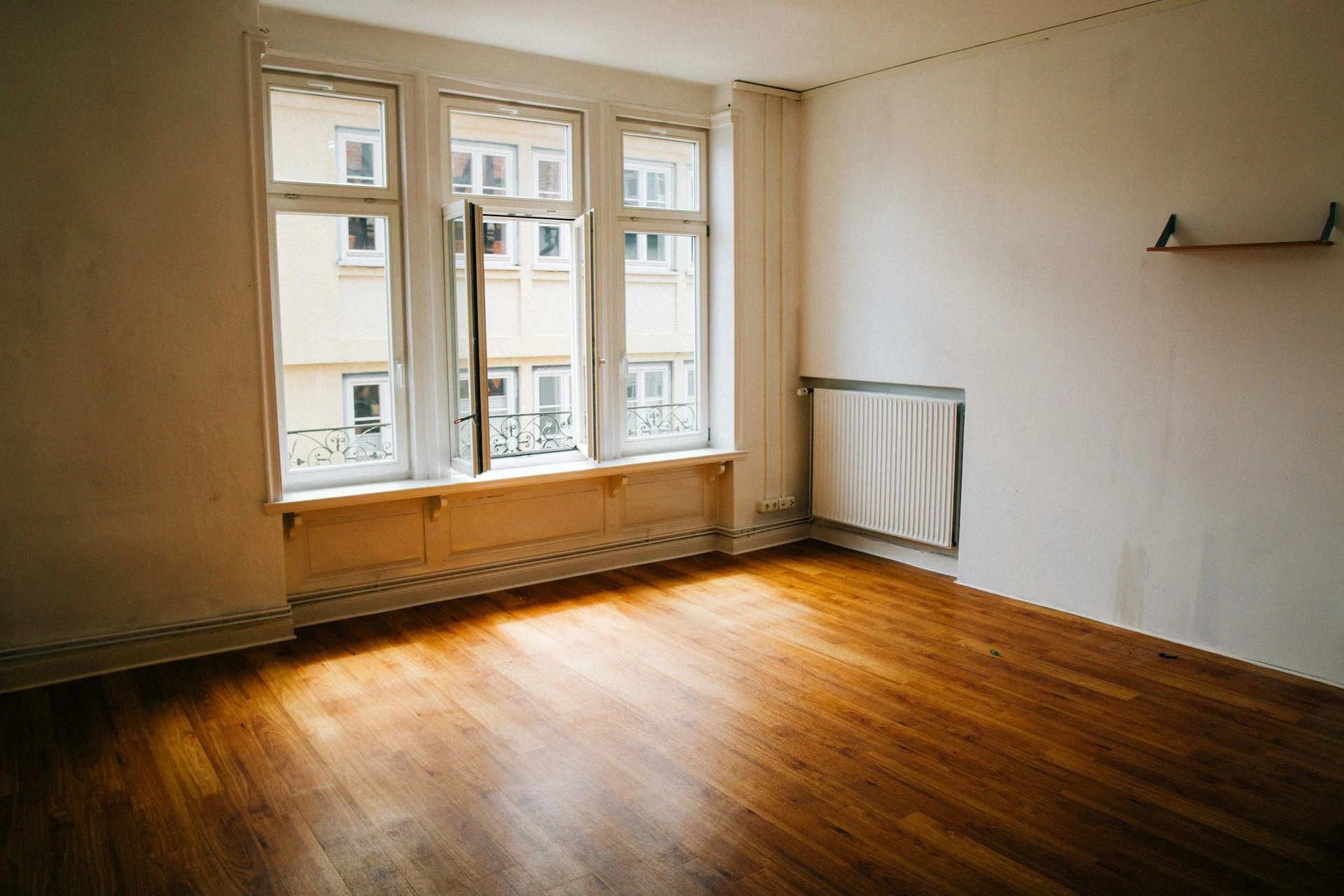moving boxes stacked in an empty apartment on moving day