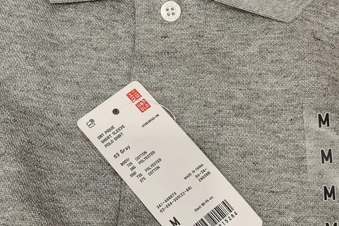 racks of clothing in a store representing a minimal wardrobe
