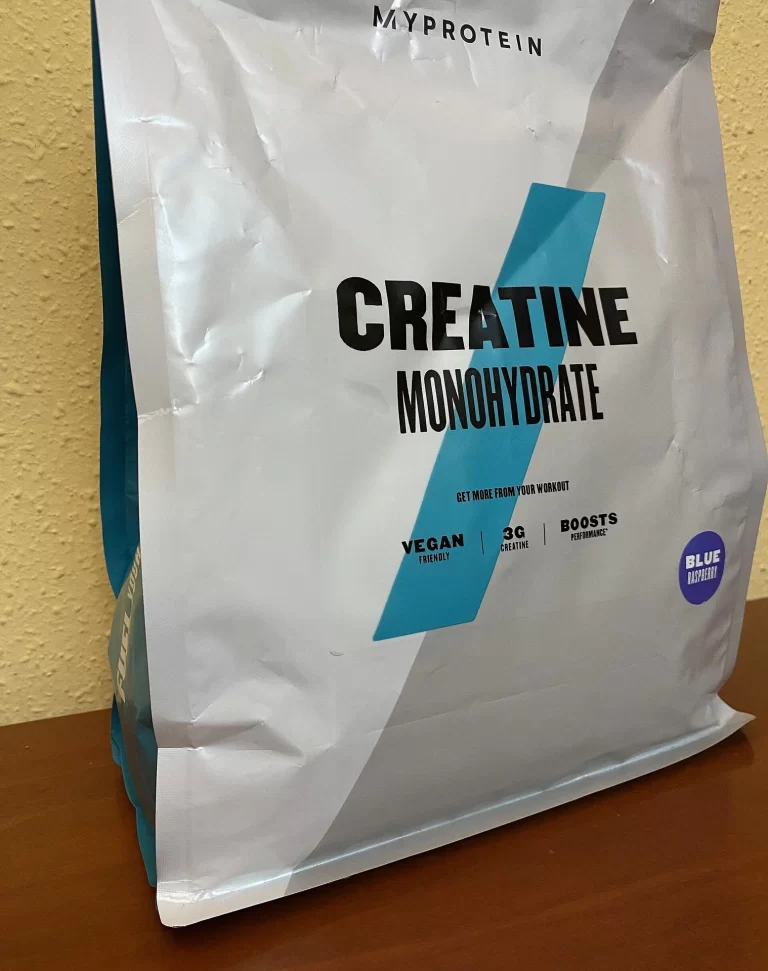 creatine monohydrate powder in a scoop