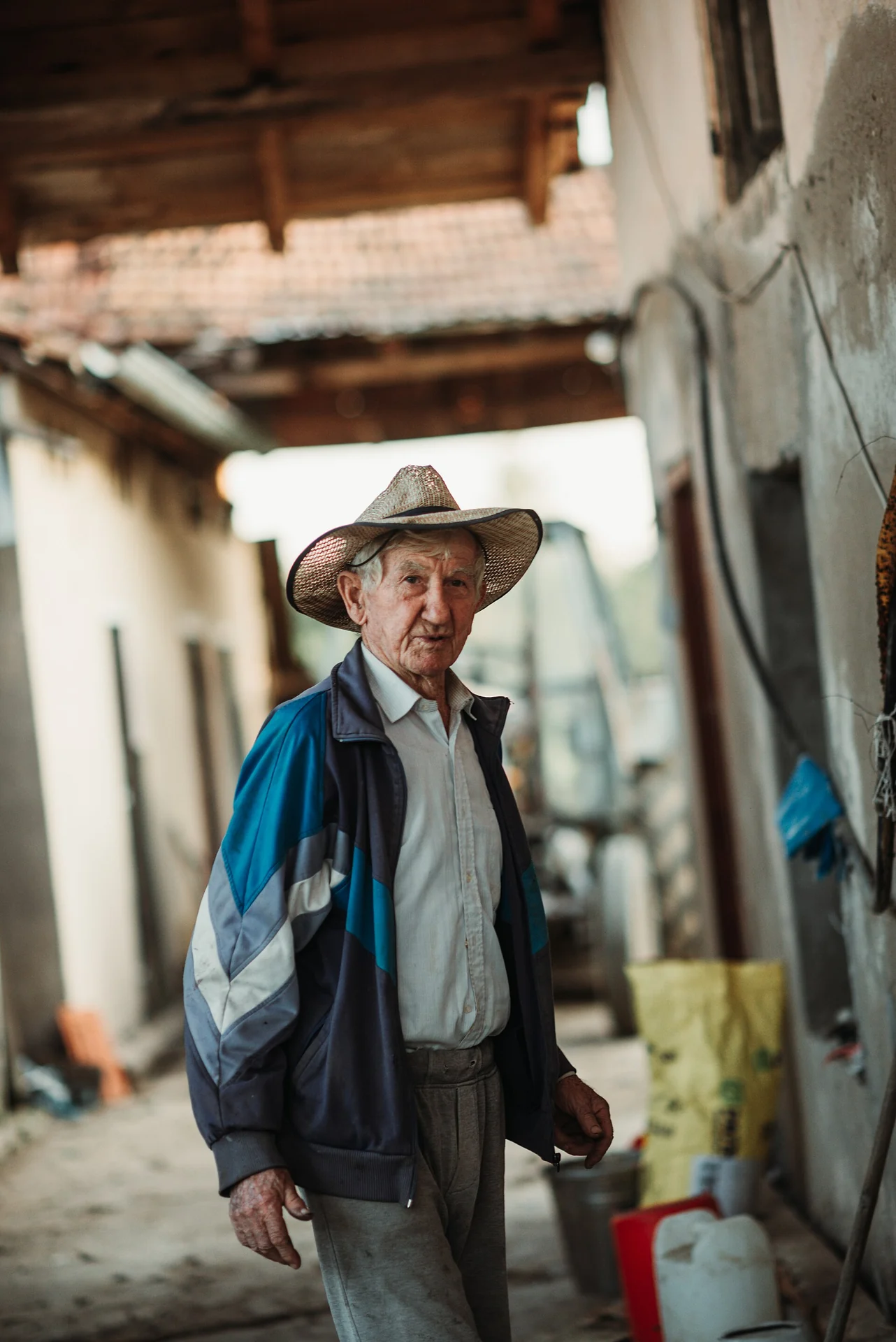confidently dressed man in well-fitted traditional clothing walking in morning light